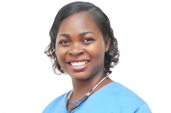 Ibukunoluwa Ogunsola Adeyanju smiling at the camera