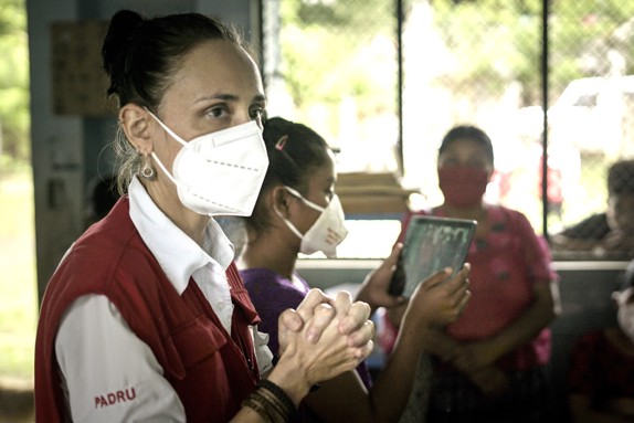 Diana Medina, IFRC, in a white face mask