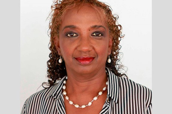 Dr Sonia T. Johnson smiling at the camera
