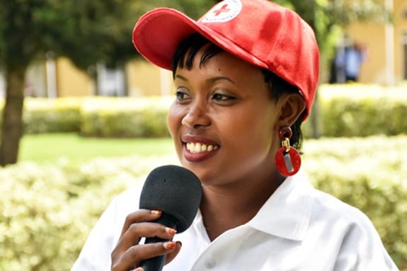 Alexia Rubuga speaking in a microphone