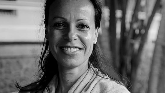 Black and white picture of Christine Cipolla smiling at the camera