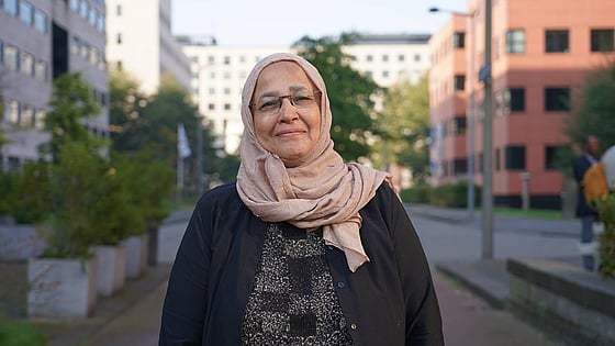 Aida Elsayed is smiling and looking straight at the camera.