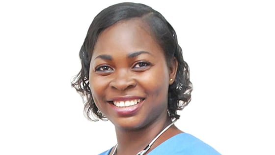 Ibukunoluwa Ogunsola Adeyanju smiling at the camera