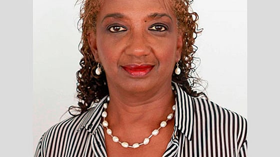 Dr Sonia T. Johnson smiling at the camera