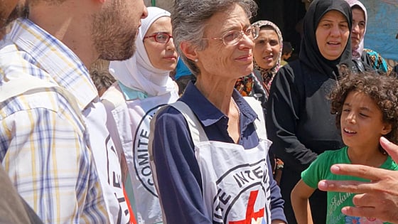 Marianne Gasser speaking with people