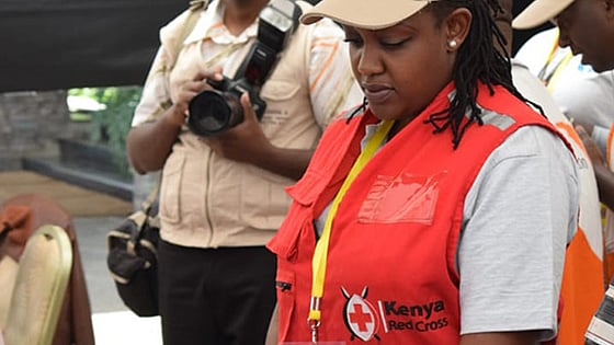 Elizabeth Murigi with a red jacket