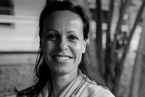 Black and white picture of Christine Cipolla smiling at the camera