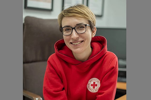 Tetiana Yeskova smiling at the camera