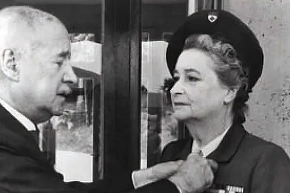 Jacqueline Mallet recieving a medal