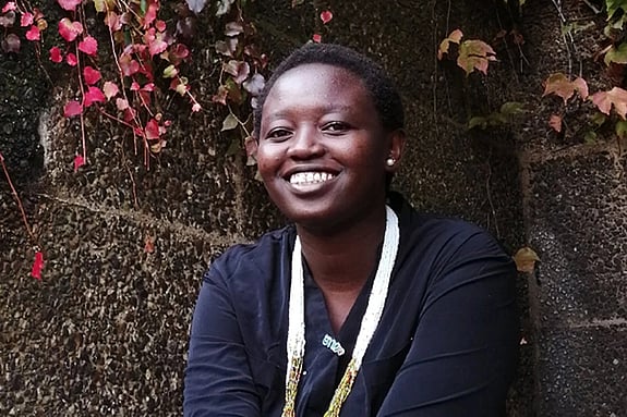 Margaret Osolo Odhiambo smiling at the camera