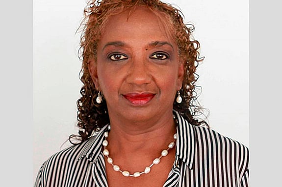 Dr Sonia T. Johnson smiling at the camera