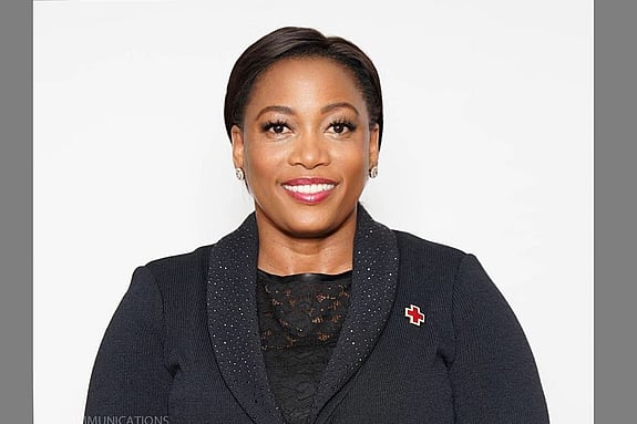 Connie Motshumi smiling at the camera