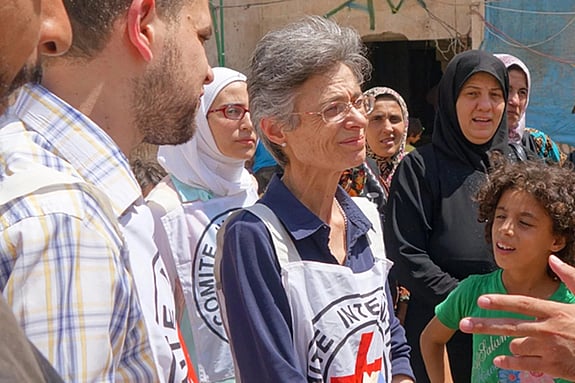 Marianne Gasser speaking with people