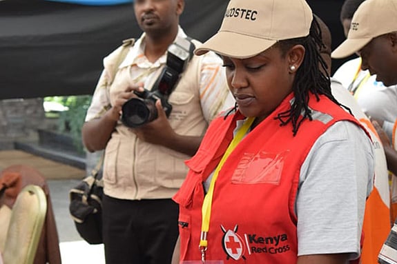 Elizabeth Murigi with a red jacket
