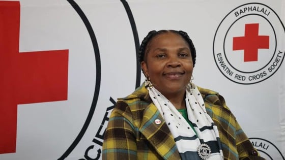 Happy Nozizwe Dlamini is smiling in to the camera.